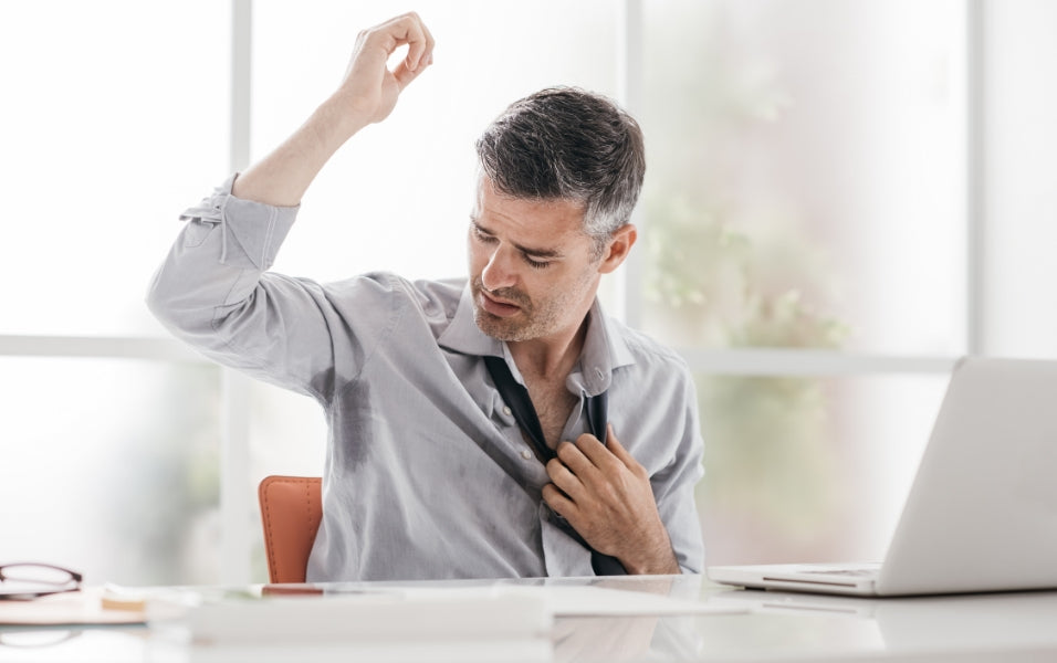 Working men showing sweating arm
